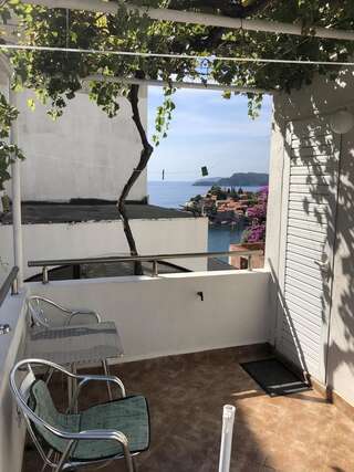 Апартаменты Apartments Sveti Stefan MNE Свети-Стефан Номер-студио с видом на море-3